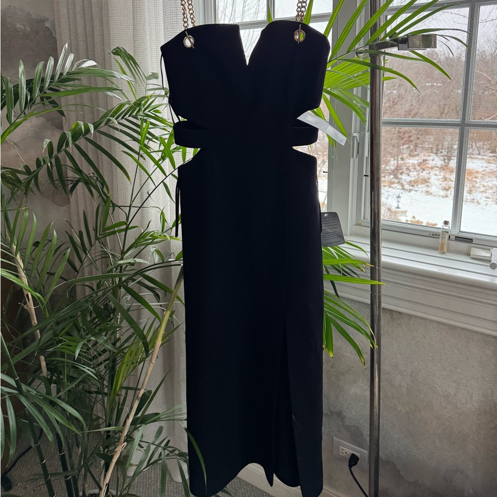 Rebecca Vallance Iman Cutout Midi Black Dress

NWT
Never work